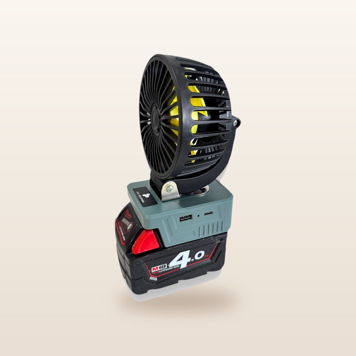 Milwaukee-compatible 18V 100mm Fan from Mr Swagman: on an 18V battery, angled view