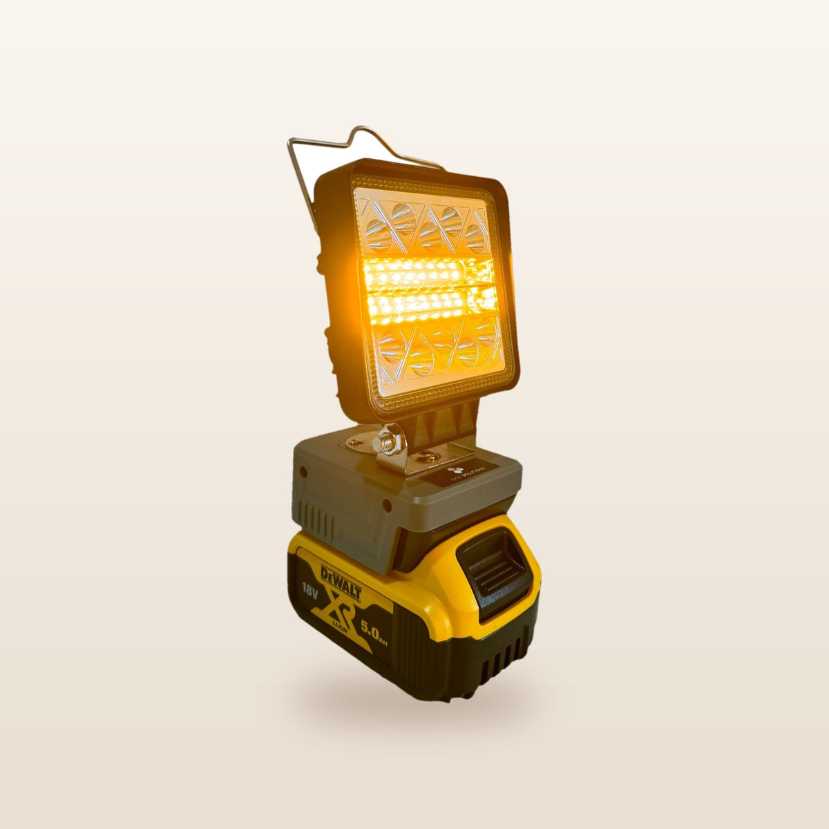 DeWalt-compatible 18V LED Camp Light: on an 18V battery, glowing orange