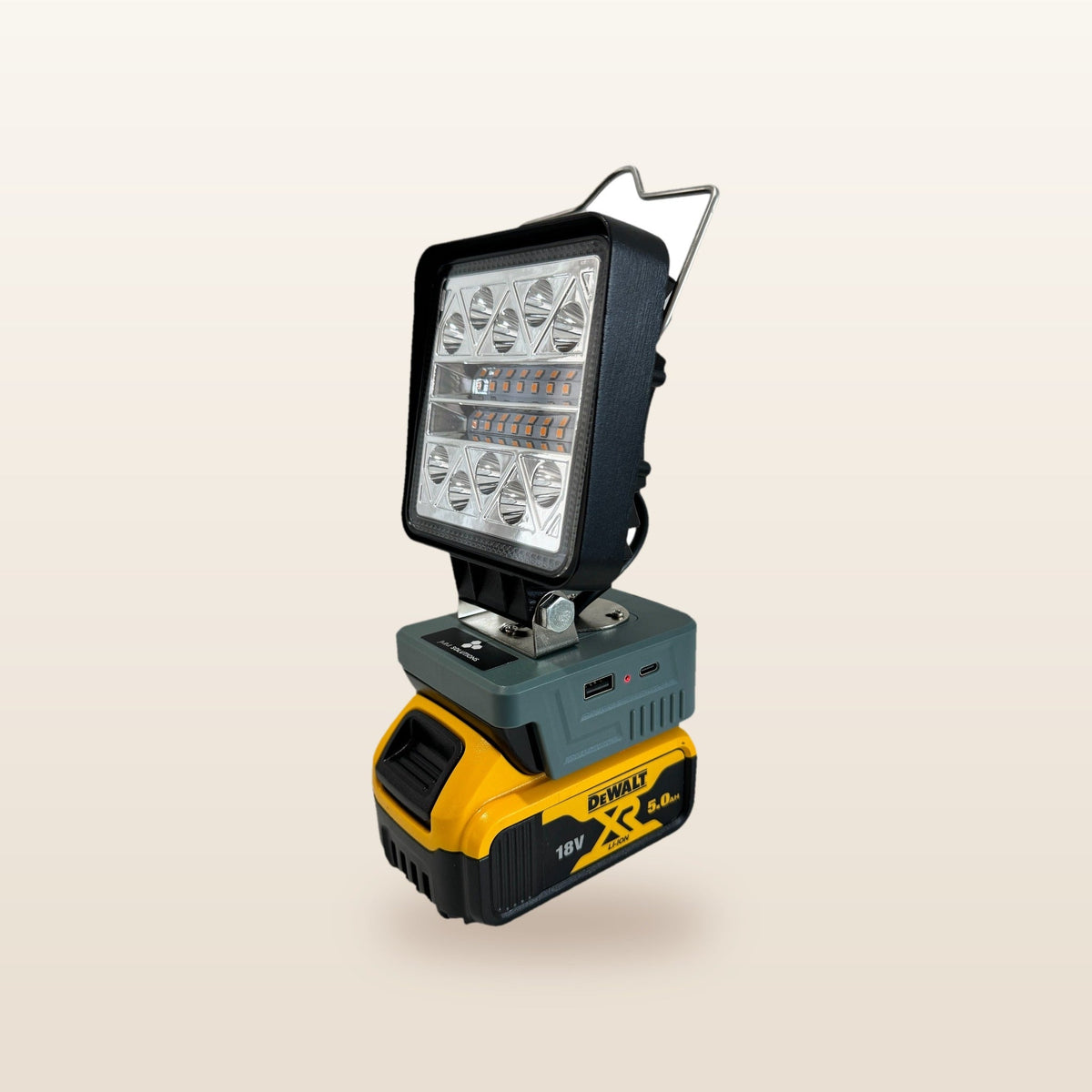 DeWalt-compatible 18V LED Camp Light: side angle on an 18V battery