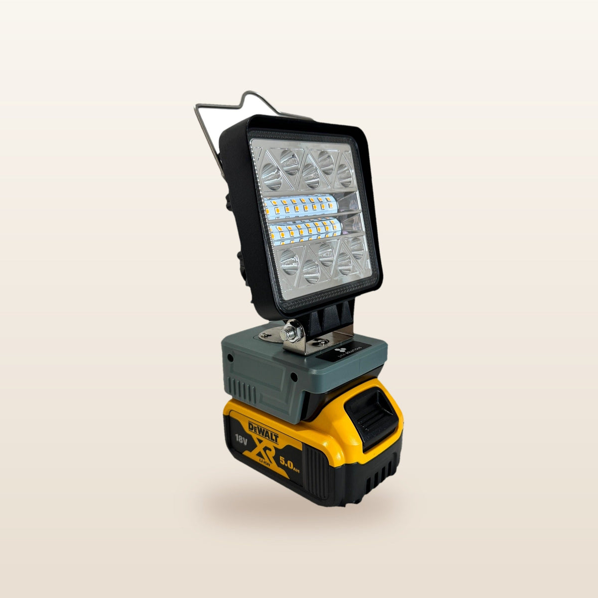 DeWalt-compatible 18V LED Camp Light: angled view on an 18V battery
