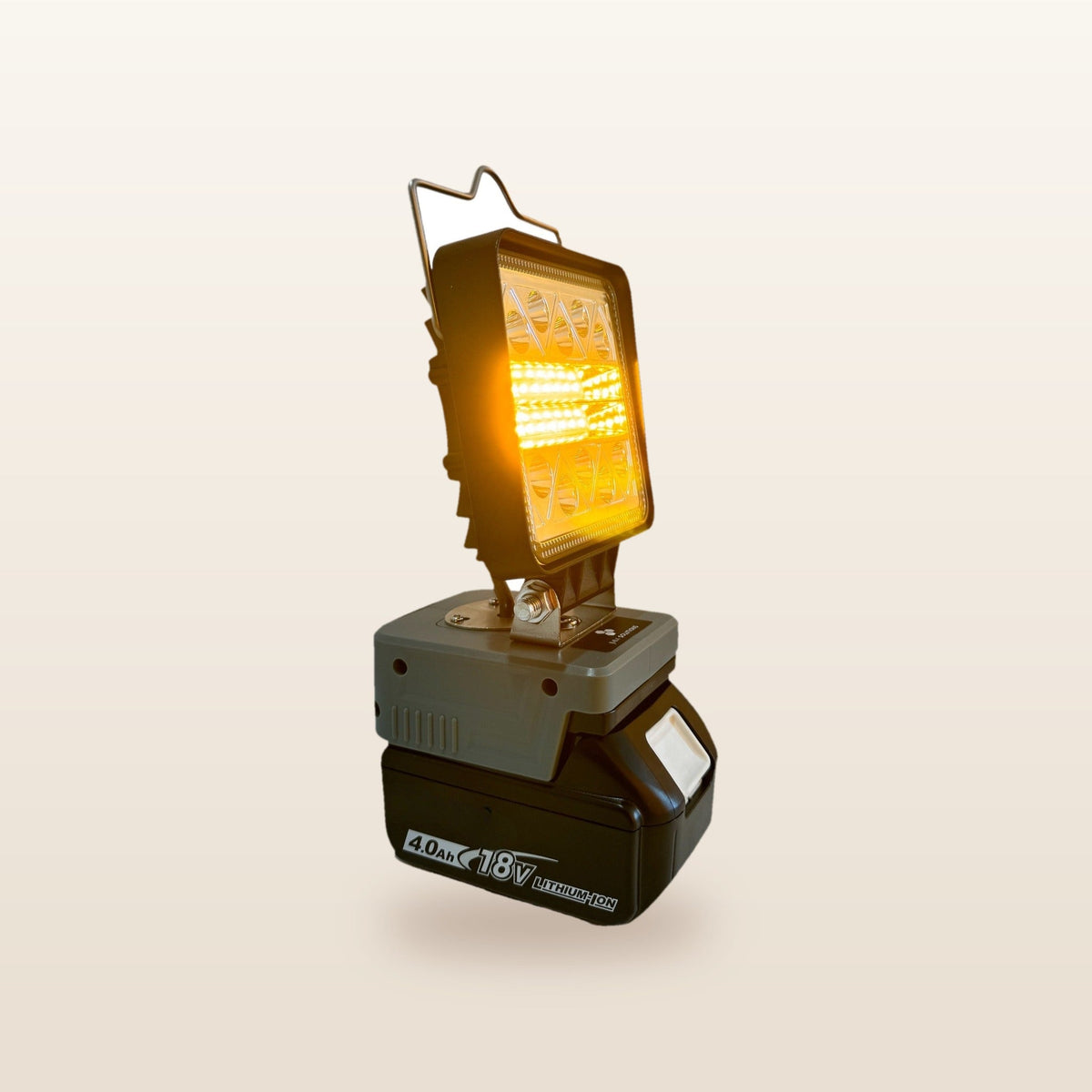 Makita-compatible 18V LED Camp Light: on an 18V battery, glowing orange