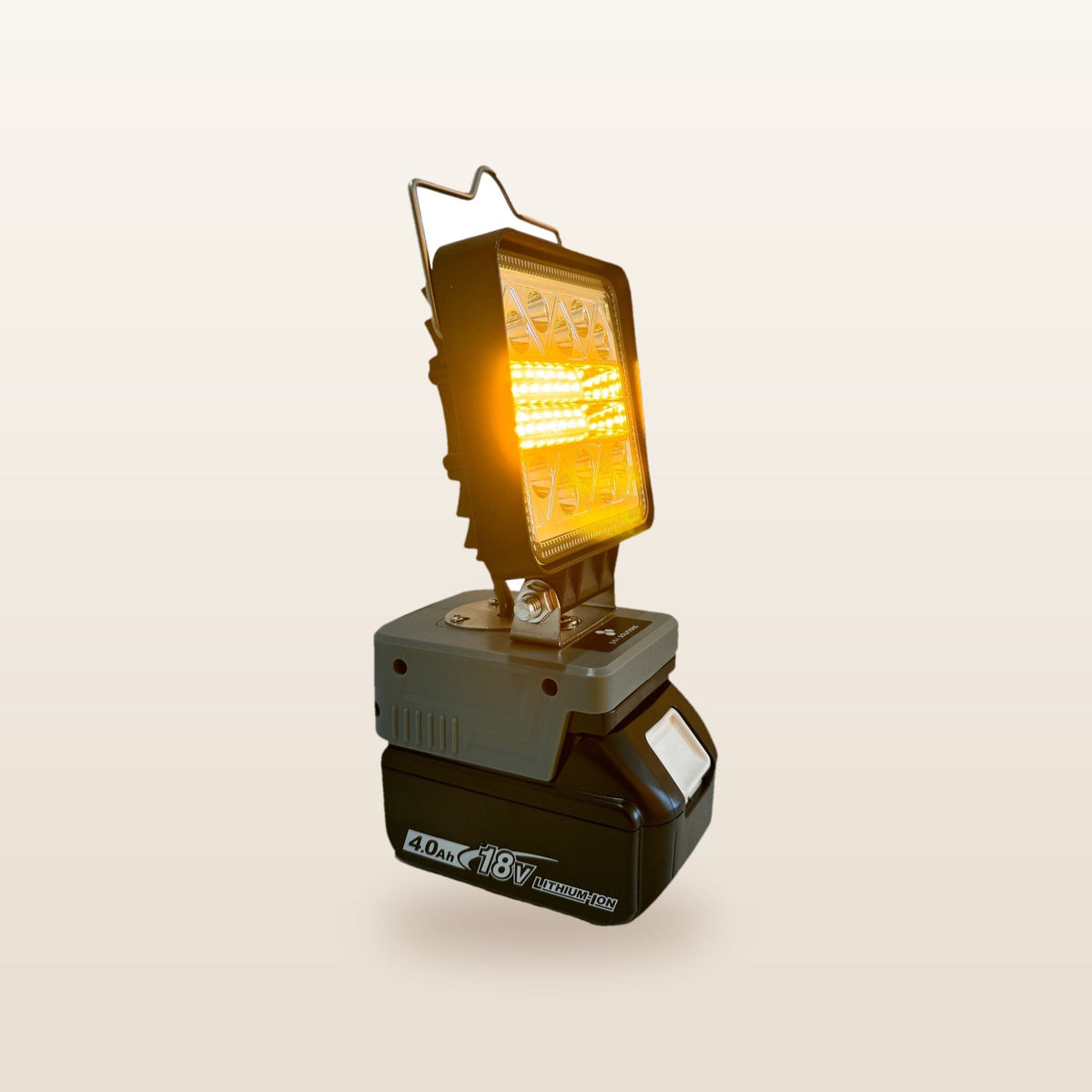 Makita-compatible 18V LED Light & Fan Bundle: LED light on an 18V battery, glowing orange