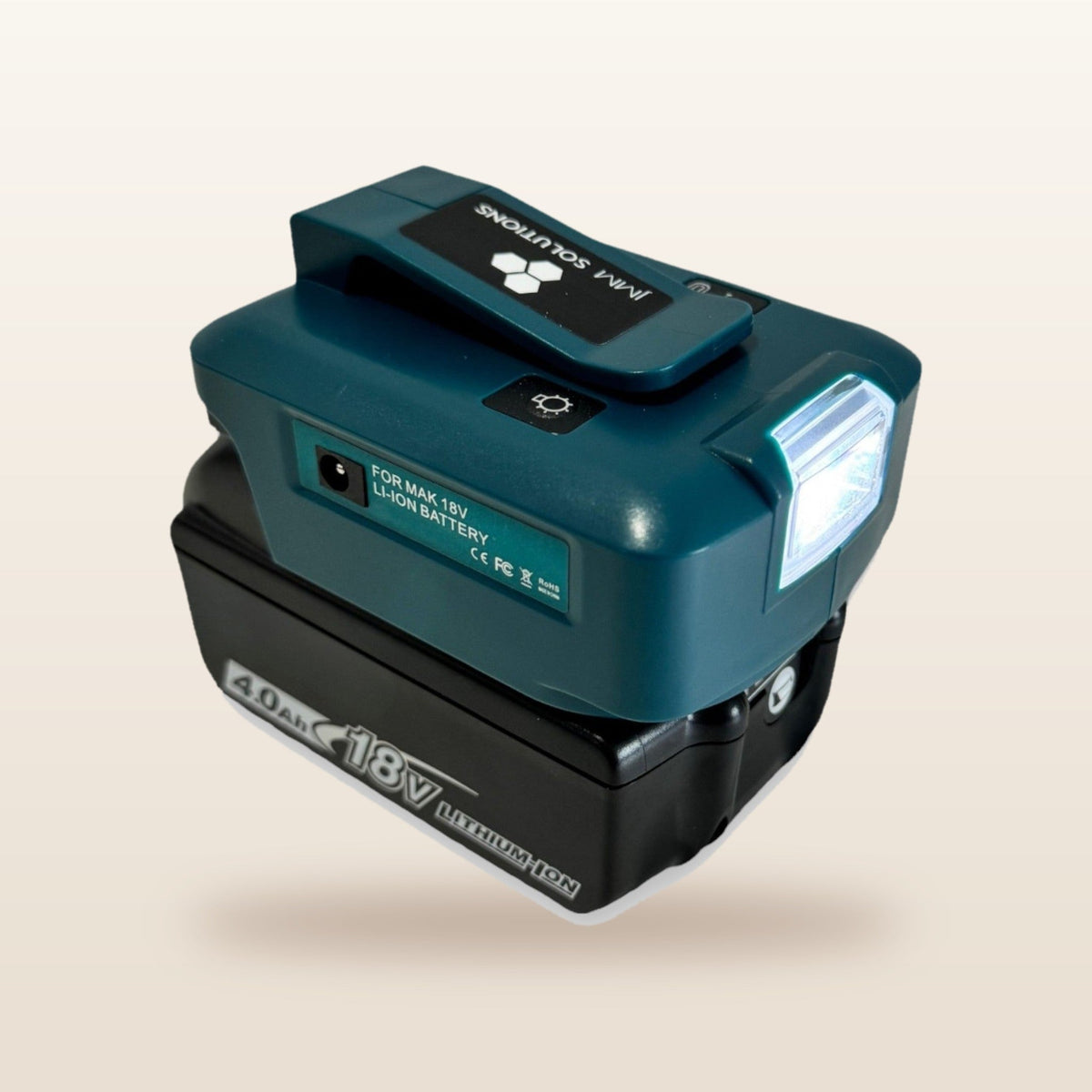 Makita-compatible USB & 12V Charger with LED Light from Mr Swagman: on an 18V battery, angled view