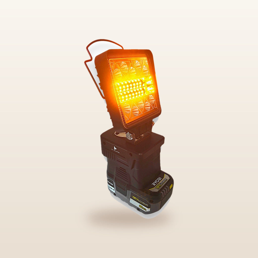 Ryobi ONE+ compatible 18V LED Light & Fan Bundle: LED light on an 18V battery, glowing orange