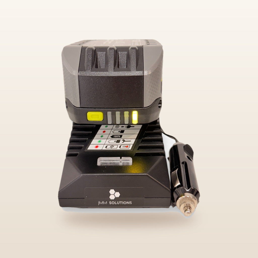 Ryobi ONE+ compatible 18V to 12V Power Supply + Auto Charger Bundle: front view with battery fitted, showing charge lights