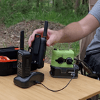 Ryobi ONE+ compatible 18V to 12V Step Down Power Supply: powering a two-way radio charger on a camp table