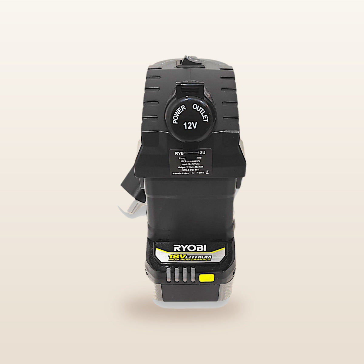 Ryobi ONE+ compatible Volt Step Down PRO: front view showing the capped 12V socket