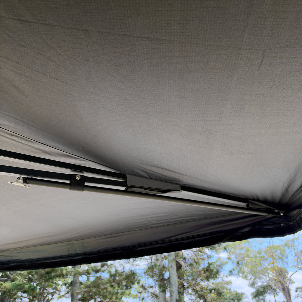 Drop-down pole stowed along an arm under the Shelta 270 canvas
