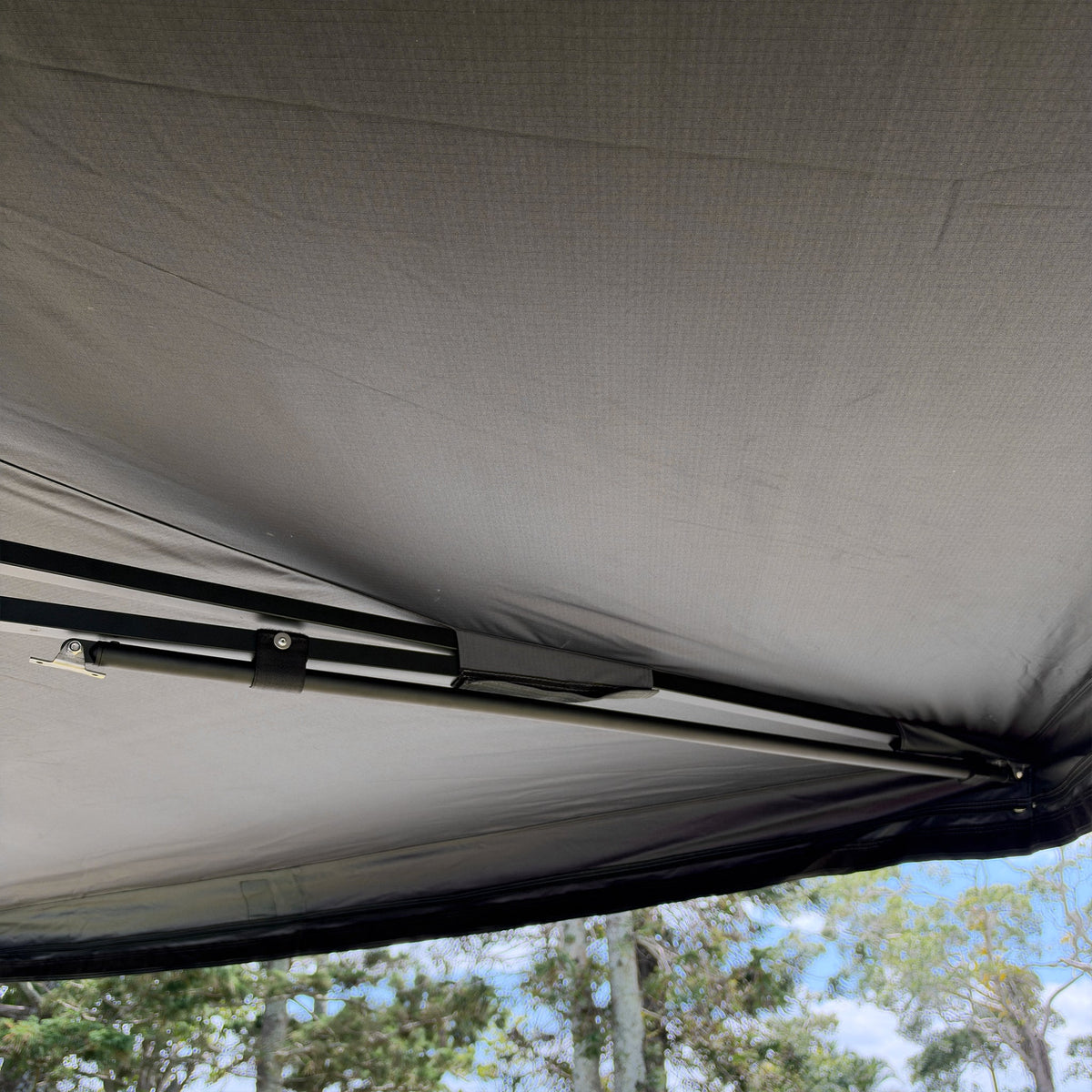 Drop-down pole stowed along an arm under the Shelta 270 canvas
