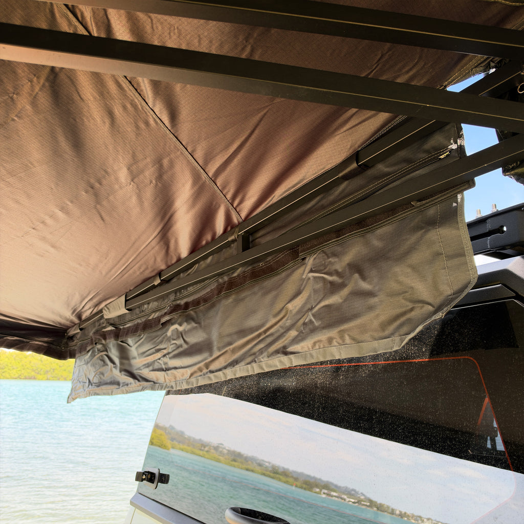 Shelta 270 magnetic weather gutter hanging across the back of the vehicle