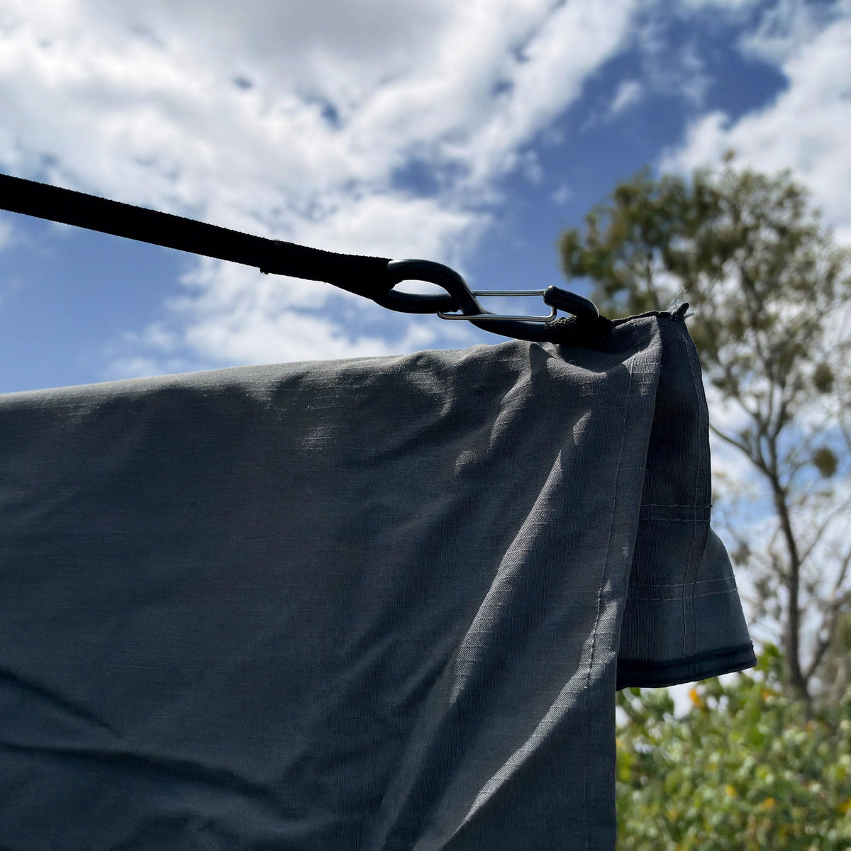 Close-up of a strap and hook holding the edge of the Shelta 270 canvas