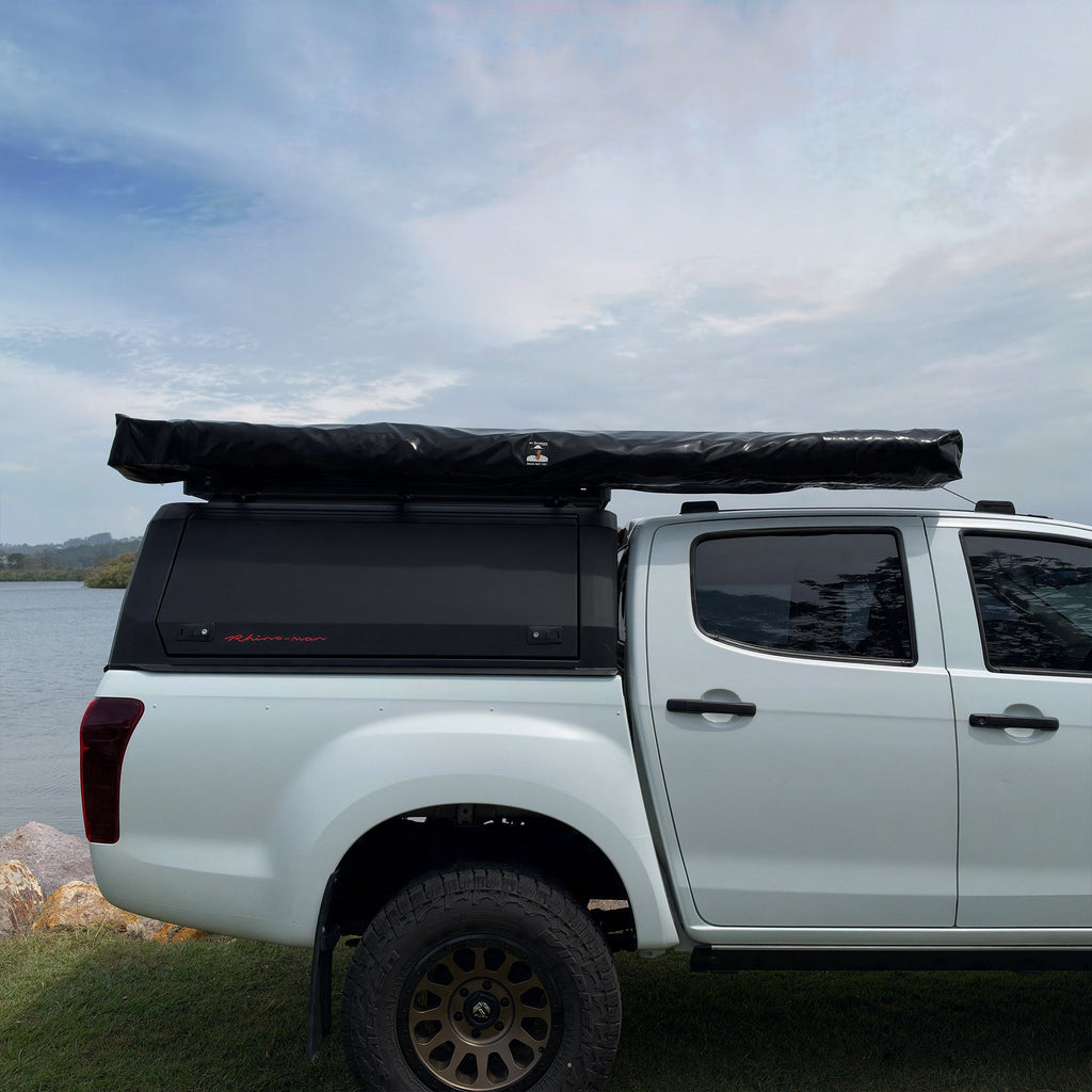 Shelta 270 awning packed in its heavy-duty PVC cover on a ute roof rack