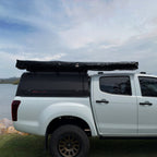 Shelta 270 awning packed in its heavy-duty PVC cover on a ute roof rack