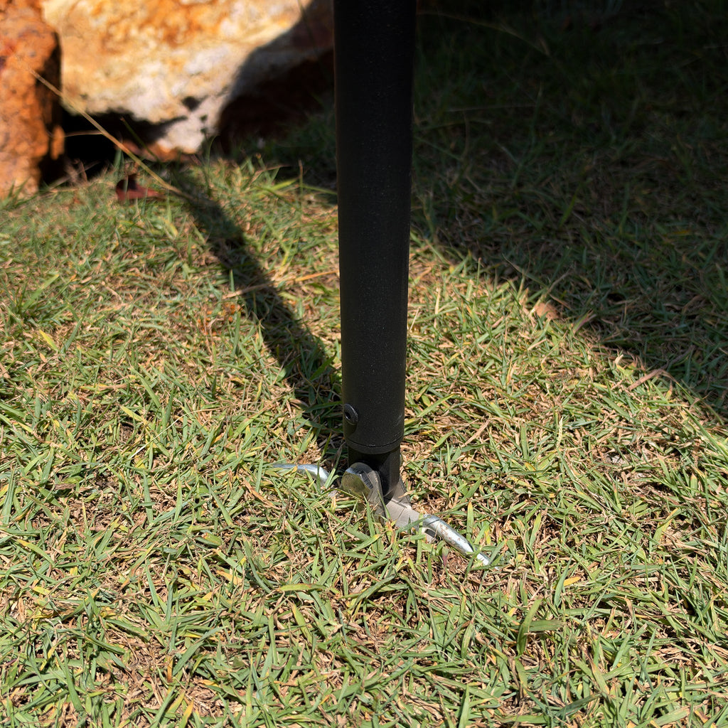 Foot of a Shelta 270 support pole pegged into the grass