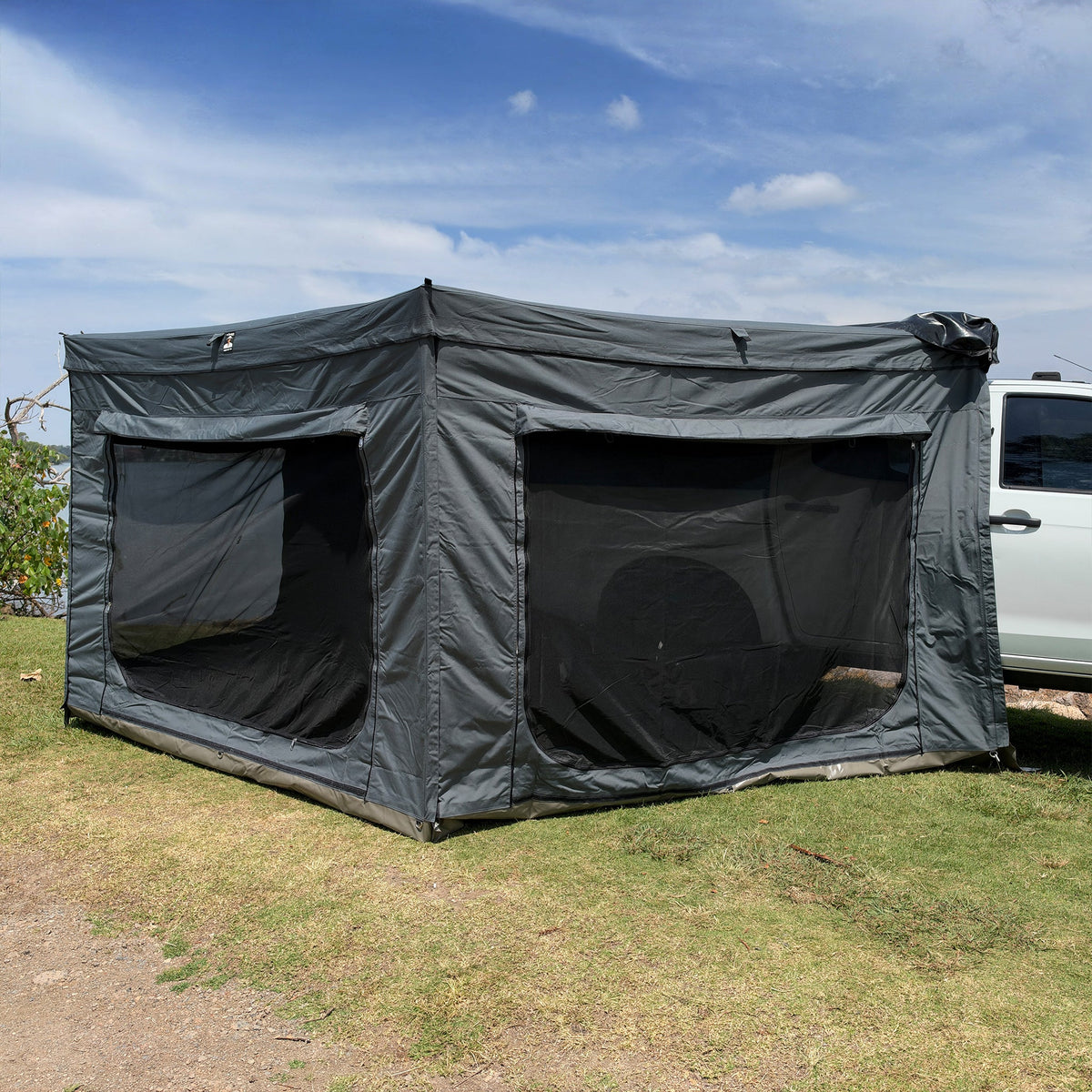 Mr Swagman Shelta 270 Awning Wall Kit fitted, making an enclosed room beside a ute