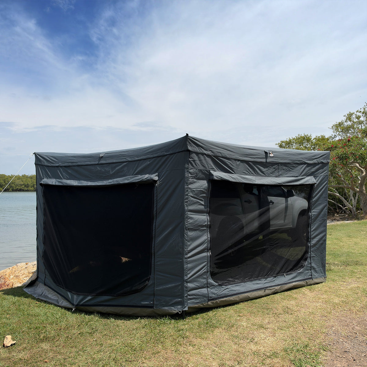 Enclosed awning room made with the Shelta 270 Wall Kit, viewed from the outer corner