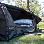 Inside the Ultimate King Single Swag through the side door, with pillow and sleeping bag