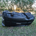 Ultimate King Single Swag rolled up in its heavy-duty PVC carry bag