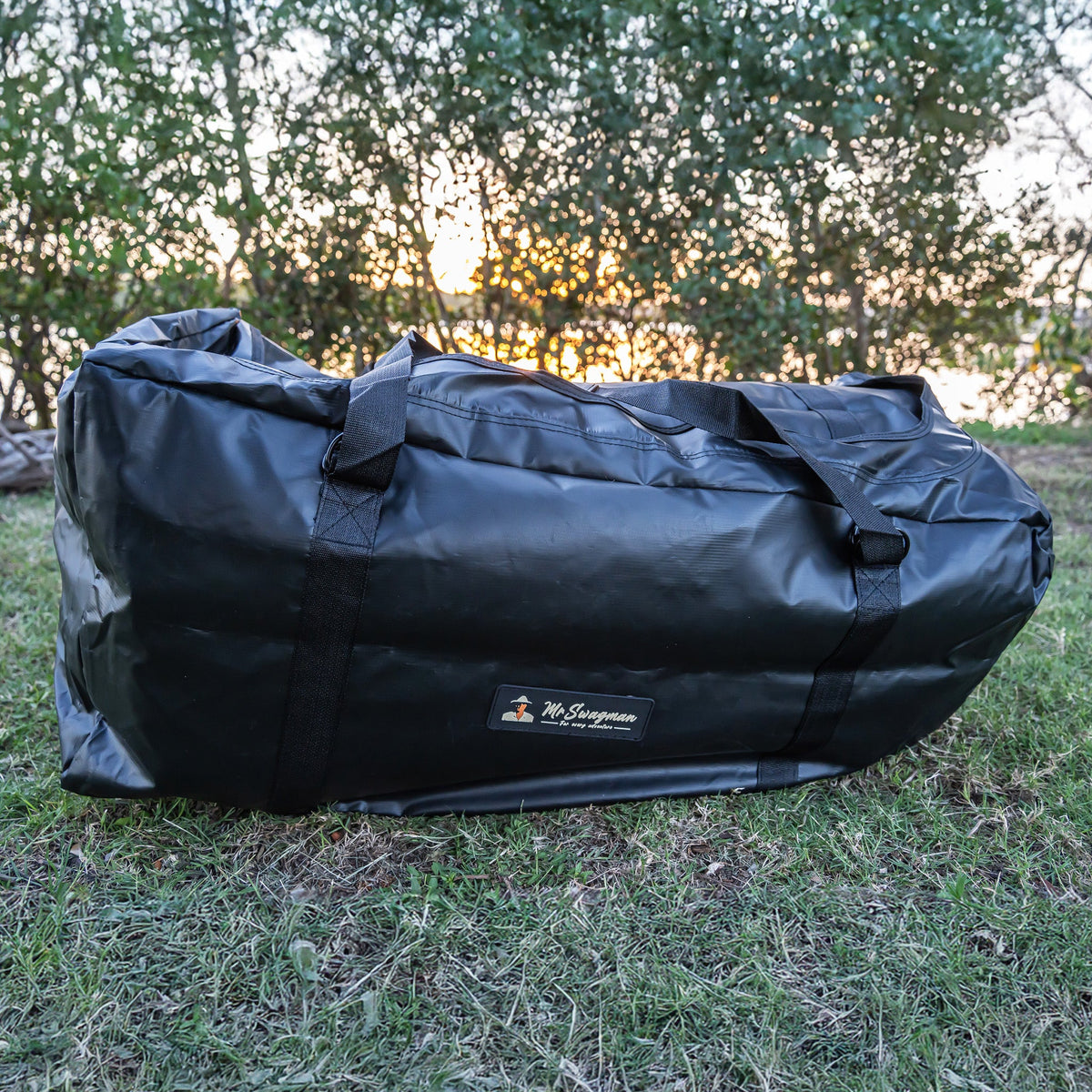 Ultimate King Single Swag rolled up in its heavy-duty PVC carry bag